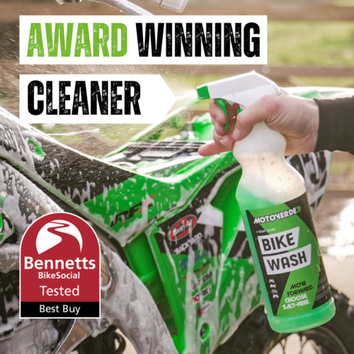 Cleaning Motocross bike with Bennett Bike Insurance Best Buy Logo
